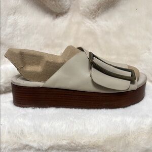 Kelsi Dagger Leather Cream and Brown Mules with Double-Buckle Design